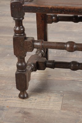Lot 1558 - A PAIR OF 17TH CENTURY ENGLISH OAK HALL CHAIRS