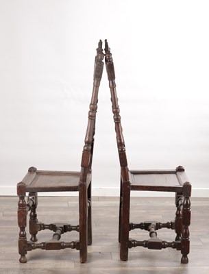 Lot 1558 - A PAIR OF 17TH CENTURY ENGLISH OAK HALL CHAIRS