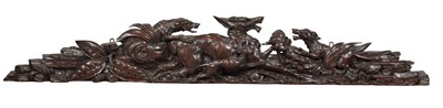 Lot 1380 - A 19TH CENTURY BLACK FOREST CARVED WALNUT DOOR PEDIMENT WITH HOUNDS AND STAG