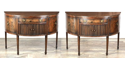 Lot 1633 - A PAIR OF GEORGE III MAHOGANY DEMI-LUNE SIDEBOARDS