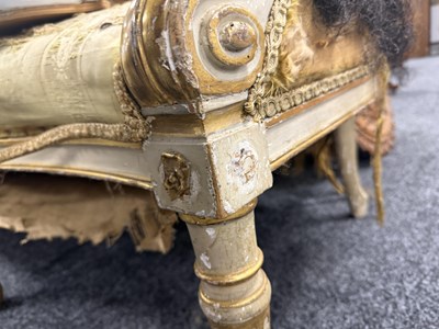 Lot 1584 - A GEORGE III PARCEL GILT AND PAINTED HEPPLEWHITE STYLE THREE SEATER SETTEE