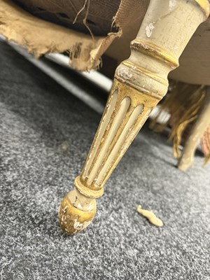 Lot 1584 - A GEORGE III PARCEL GILT AND PAINTED HEPPLEWHITE STYLE THREE SEATER SETTEE