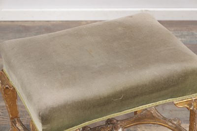 Lot 1514 - A GEORGE II GILTWOOD DRESSING STOOL