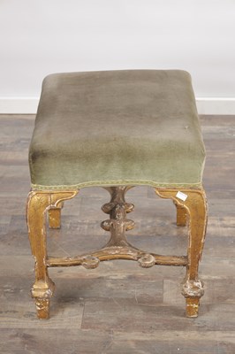 Lot 1514 - A GEORGE II GILTWOOD DRESSING STOOL
