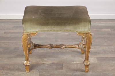 Lot 1514 - A GEORGE II GILTWOOD DRESSING STOOL
