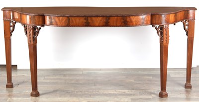 Lot 1615 - A GEORGE III FIGURED MAHOGANY SERPENTINE SERVING TABLE