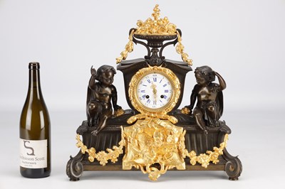 Lot 1339 - GUYENOT, PARIS. A 19TH CENTURY FRENCH PATINATED BRONZE AND ORMOLU FIGURAL MANTEL CLOCK