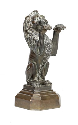 Lot 1116 - A 19TH CENTURY BRONZE LION DOORSTOP ON STEPPED PLINTH BASE