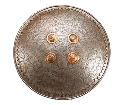 Lot 844 - A MUGHAL EMPIRE STEEL DHAL SHIELD WITH FOUR COPPER BOSSES