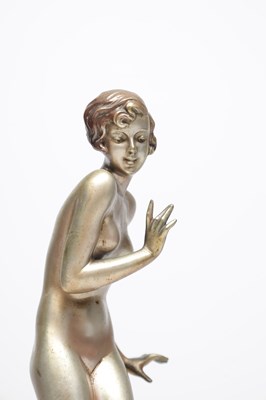 Lot 1089 - JOSEF LORENZL AN ART DECO AUSTRIAN COLD-PAINTED BRONZE FIGURE OF A SEMI-NUDE FEMALE ON ONYX BASE