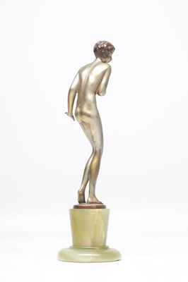 Lot 1089 - JOSEF LORENZL AN ART DECO AUSTRIAN COLD-PAINTED BRONZE FIGURE OF A SEMI-NUDE FEMALE ON ONYX BASE