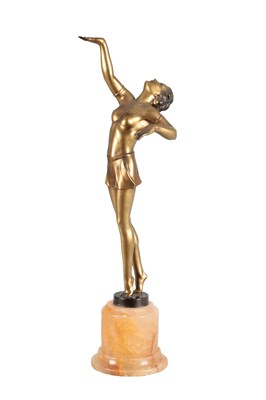 Lot 1029 - AN ART DECO GILT METAL FIGURE OF A DANCER ON AN ONYX BASE