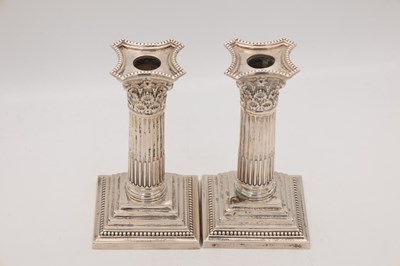 Lot 97 - A PAIR OF LATE VICTORIAN ENGLISH SILVER CANDLESTICKS