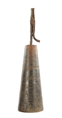 Lot 1124 - AN 18TH CENTURY IRON RUSH LIGHT ON AN UNUSUAL CONICAL WOODEN BASE