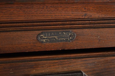 Lot 1582 - AN EARLY 20TH CENTURY OAK FILING CABINET BY H. W. CASLON