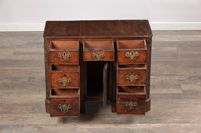 Lot 1556 - A MINIATURE GEORGE III MAHOGANY KNEEHOLE DESK