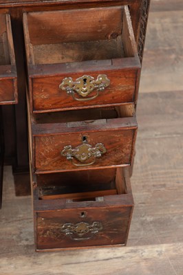 Lot 1556 - A MINIATURE GEORGE III MAHOGANY KNEEHOLE DESK