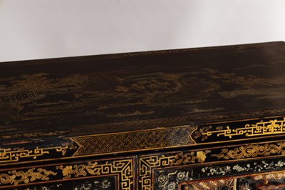 Lot 1487 - A LATE 19TH CENTURY CHINESE INLAID BLACK LACQUER CABINET WITH RELIEF CARVED GILT PANELS