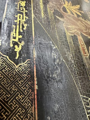 Lot 1487 - A LATE 19TH CENTURY CHINESE INLAID BLACK LACQUER CABINET WITH RELIEF CARVED GILT PANELS