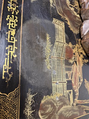 Lot 1487 - A LATE 19TH CENTURY CHINESE INLAID BLACK LACQUER CABINET WITH RELIEF CARVED GILT PANELS