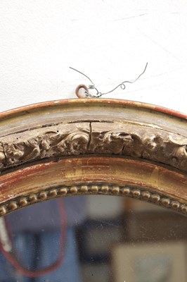 Lot 1496 - A LATE 19TH CENTURY GILTWOOD ARCH-TOP WALL MIRROR