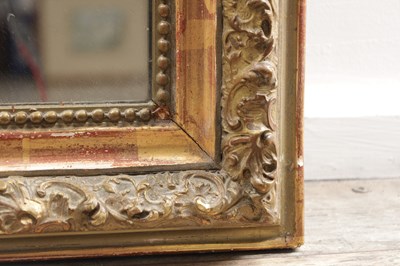 Lot 1496 - A LATE 19TH CENTURY GILTWOOD ARCH-TOP WALL MIRROR