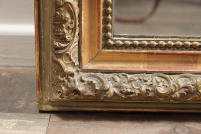 Lot 1496 - A LATE 19TH CENTURY GILTWOOD ARCH-TOP WALL MIRROR
