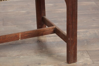 Lot 1579 - A GEORGE III MAHOGANY UPHOLSTERED DRESSING STOOL
