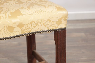 Lot 1579 - A GEORGE III MAHOGANY UPHOLSTERED DRESSING STOOL