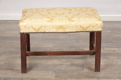 Lot 1579 - A GEORGE III MAHOGANY UPHOLSTERED DRESSING STOOL