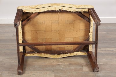 Lot 1579 - A GEORGE III MAHOGANY UPHOLSTERED DRESSING STOOL
