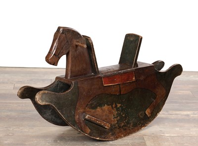 Lot 1144 - A 19TH CENTURY CARVED AND PAINTED WOOD ROCKING HORSE