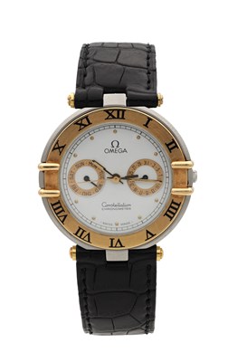 Lot 433 - AN OMEGA CONSTELLATION STAINLESS STEEL AND 18CT GOLD DAY-DATE CHRONOMETER WRIST WATCH