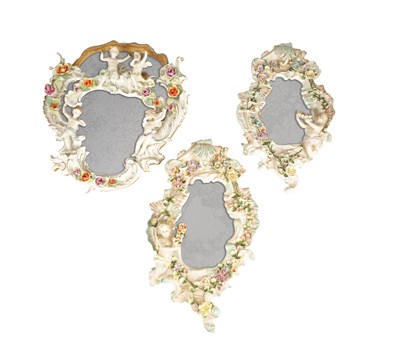 Lot 637 - A PAIR OF LATE 19TH CENTURY DRESDEN STYLE PORCELAIN HANGING MIRRORS