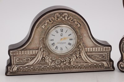 Lot 102 - TWO ENGLISH SILVER MOUNTED MINIATURE MANTEL CLOCKS