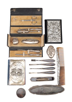 Lot 47 - A COLLECTION OF LATE 19TH TO EARLY 20TH CENTURY ENGLISH SILVER-MOUNTED TOILET AND STATIONERY ITEMS