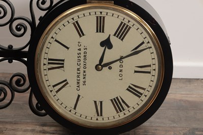 Lot 1323 - A GOOD LATE 19TH CENTURY CAMERER, CUSS & CO LONDON DOUBLE-SIDED FUSEE RAILWAY STATION CLOCK ON SCROLLED CAST IRON BRACKET