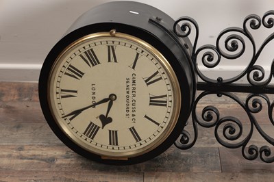Lot 1323 - A GOOD LATE 19TH CENTURY CAMERER, CUSS & CO LONDON DOUBLE-SIDED FUSEE RAILWAY STATION CLOCK ON SCROLLED CAST IRON BRACKET