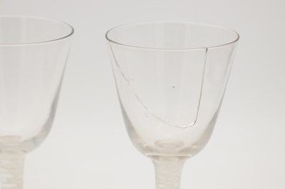 Lot THREE 18TH/19TH CENTURY ENGLISH GLASS WINE GLASSES WITH OPAQUE TWIST STEMS