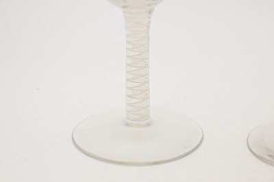 Lot THREE 18TH/19TH CENTURY ENGLISH GLASS WINE GLASSES WITH OPAQUE TWIST STEMS