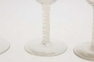 Lot THREE 18TH/19TH CENTURY ENGLISH GLASS WINE GLASSES WITH OPAQUE TWIST STEMS