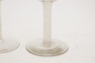 Lot THREE 18TH/19TH CENTURY ENGLISH GLASS WINE GLASSES WITH OPAQUE TWIST STEMS