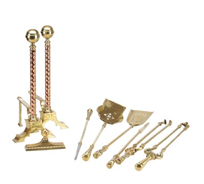 Lot 1123 - A SET OF 19TH CENTURY BRASS AND COPPER TOPPED FIRE IRONS AND FIRE DOGS