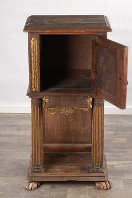 Lot 1524 - A 17TH CENTURY ITALIAN WALNUT AND PARCEL-GILT SIDE CABINET ON STAND