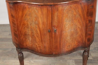 Lot 1602 - A GEORGE III MAHOGANY SERPENTINE SIDE CABINET