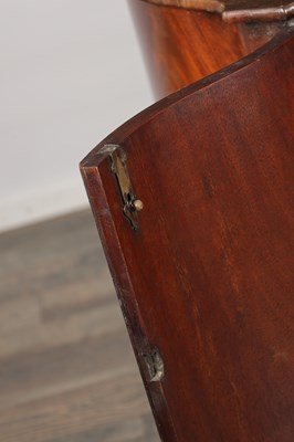 Lot 1602 - A GEORGE III MAHOGANY SERPENTINE SIDE CABINET
