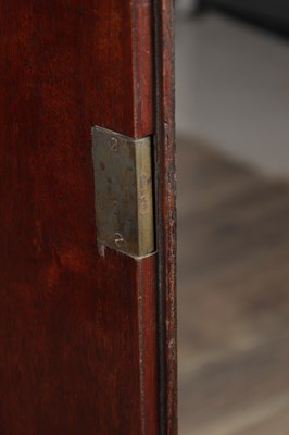 Lot 1602 - A GEORGE III MAHOGANY SERPENTINE SIDE CABINET