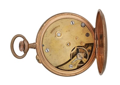 Lot 324 - AN ART NOUVEAU BRASS WATCH HOLDER AND POCKET WATCH