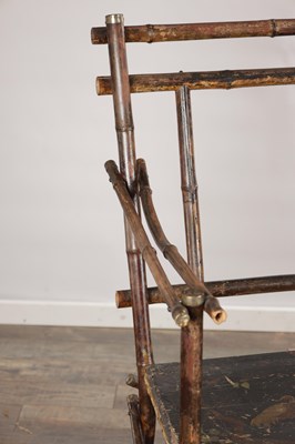 Lot 1557 - A LATE 19TH CENTURY BAMBOO TWO-SEATER SETTEE