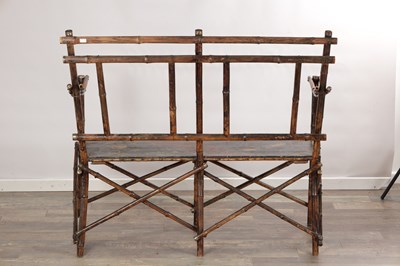 Lot 1557 - A LATE 19TH CENTURY BAMBOO TWO-SEATER SETTEE